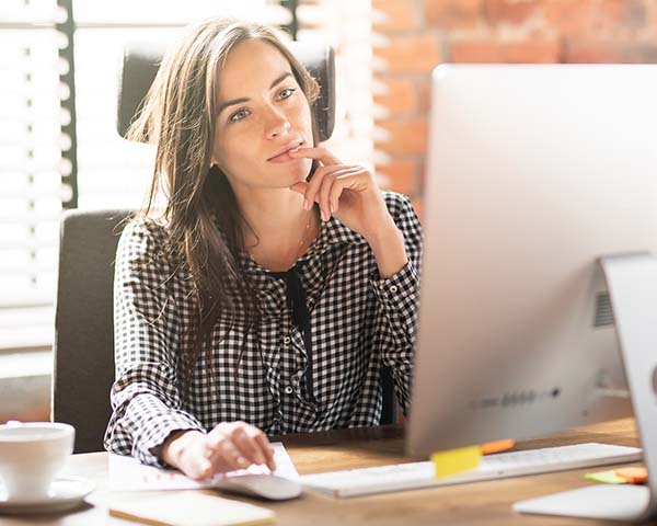 Lady doing eLearning on her computer